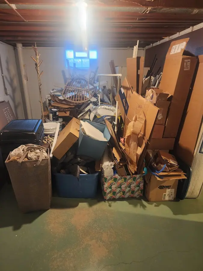 Roll-off dumpster container at job site for 15 Yard Dumpster Rental in Edgewood